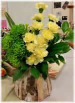 Flowers used - Carnation and Anastasia Green Chrysanthemum.  The wood element is a container covered with Birch Bark Sheets.