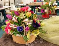 Flowers used - Tulips, Carnations, Alstroemeria in a wicker basket.