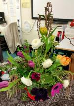 Flowers used - Tulips, Anemone & Ranunculus.  The container is a small metal watering can.